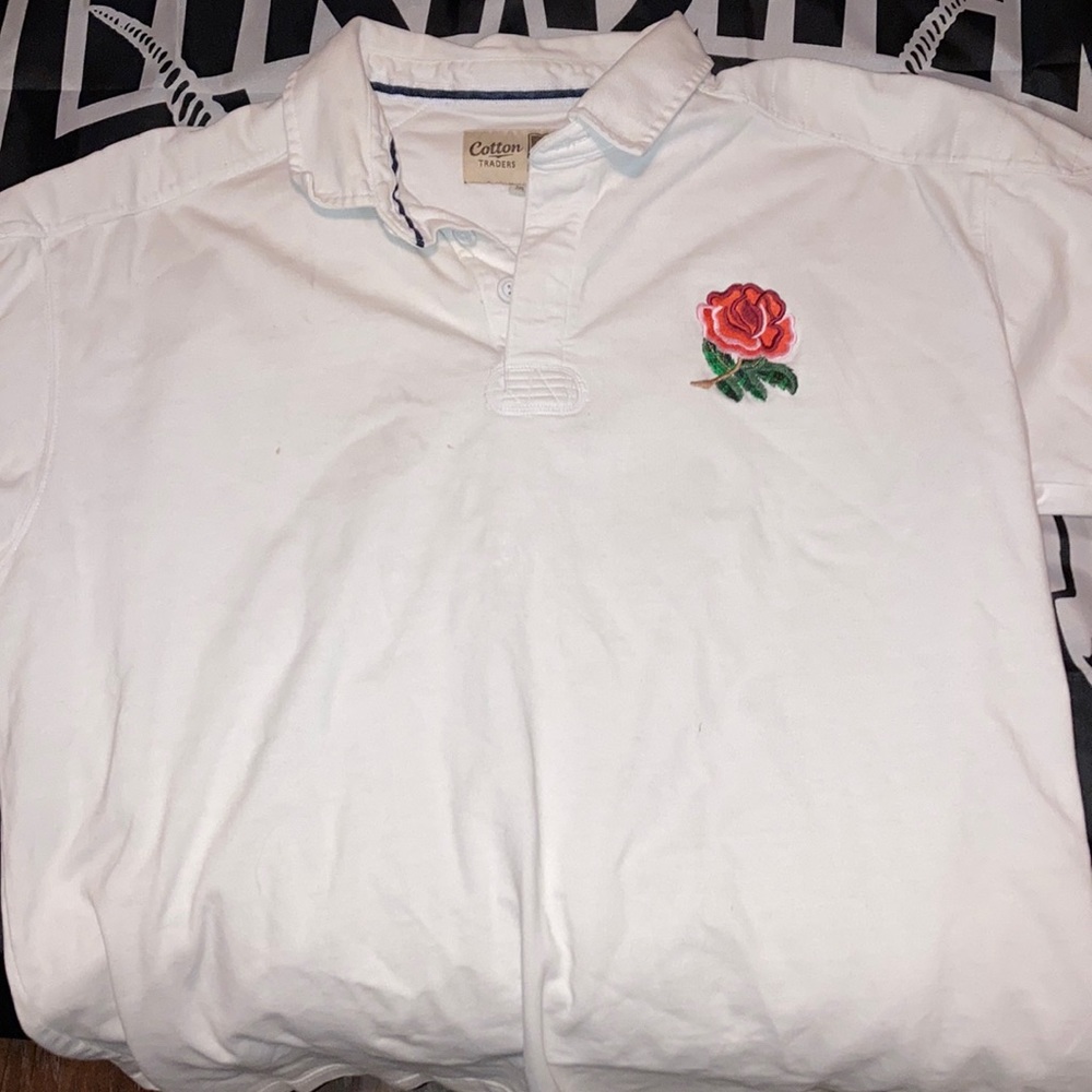 Polo shirt with rose